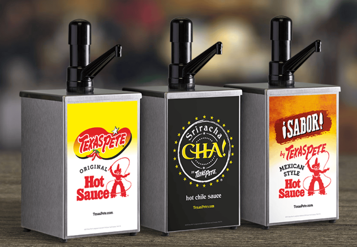 three flavors of Texas Pete hot sauce pumps for the foodservice industry
