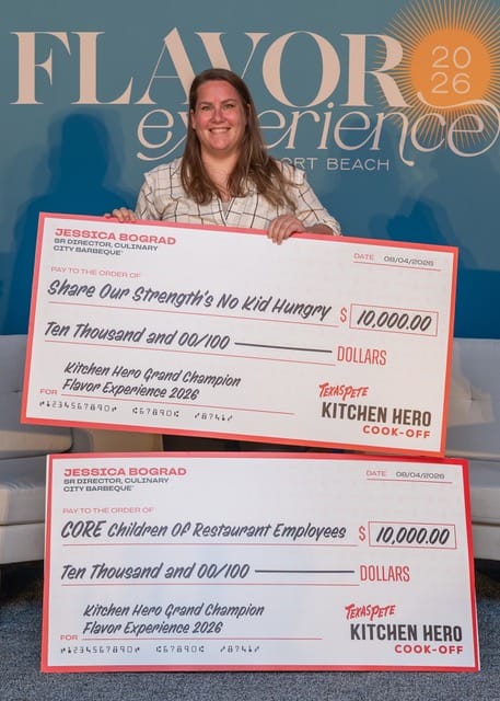 Jessica Bograd with two charity checks